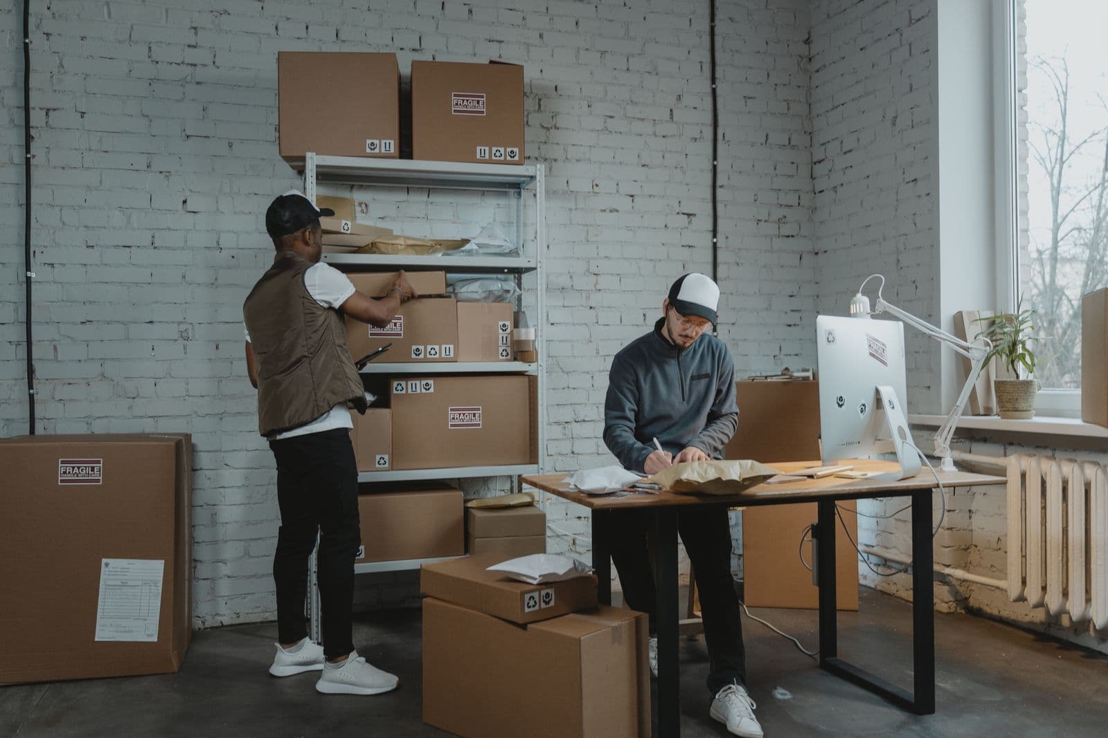 Warehouse associate handling boxes